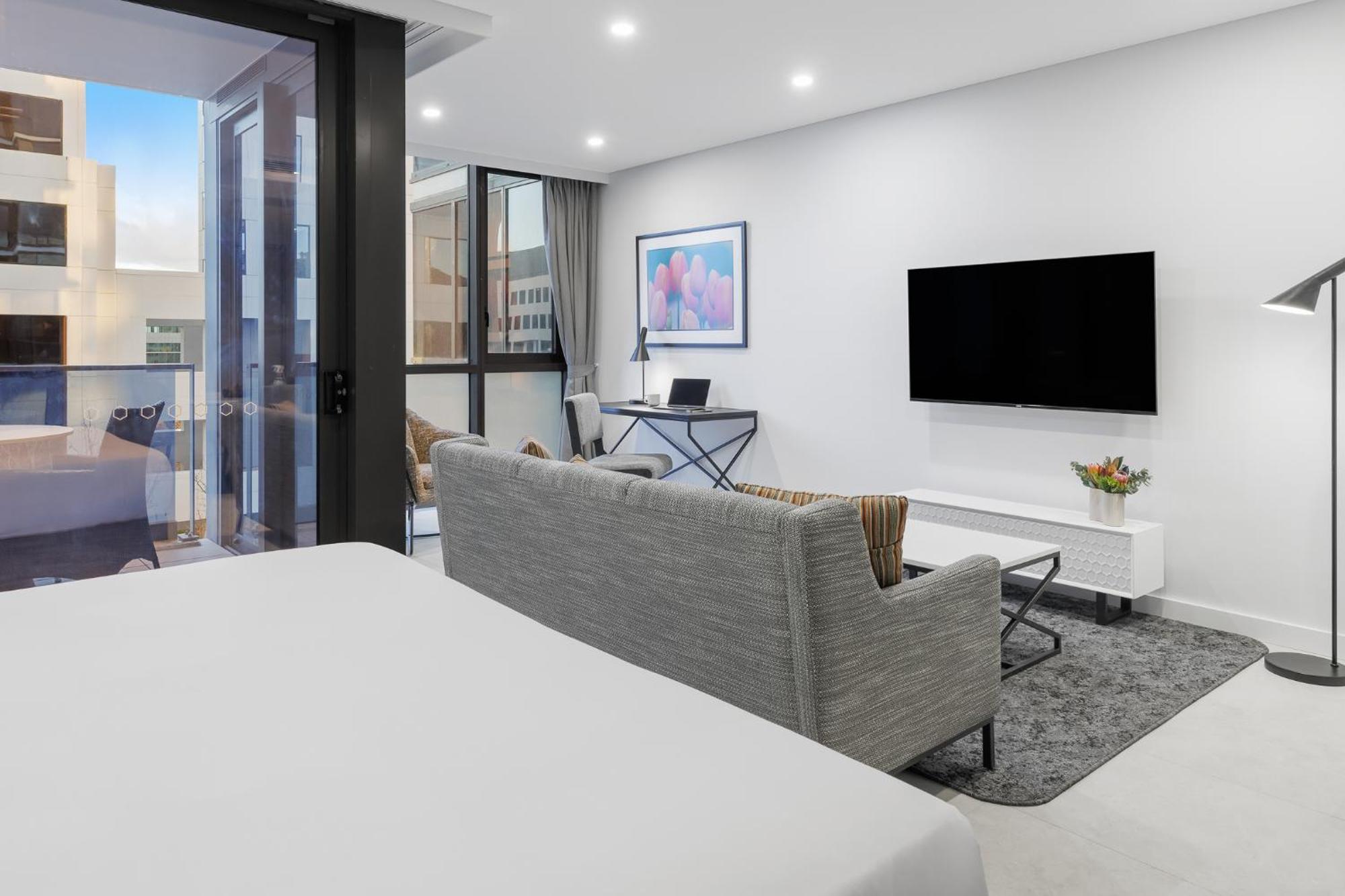 Meriton Suites Canberra Ngoại thất bức ảnh The interior of a typical apartment